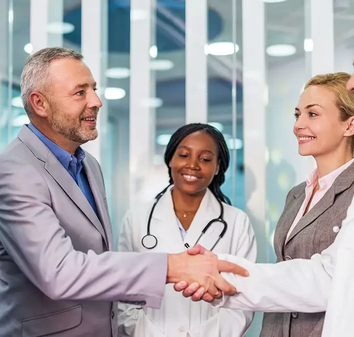 Happy business people and doctors came to an agreement.